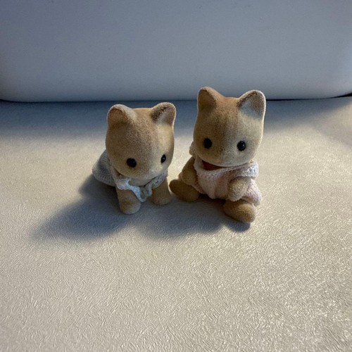 Poupée bébé jumeau chat