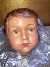 (e) tête de poupée CLAUDINET