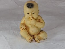 Ornement de poupée bébé en