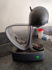 cafetière dolce gusto de couleur noir, en excellent état de marche.