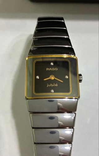 Montre quartz rado - à,
