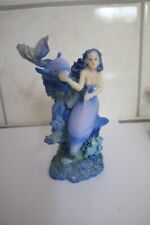 Bibelot sirène et dauphins 