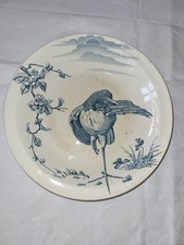 1 grand plat rond en faïence