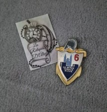 Insigne / pucelle 6 e