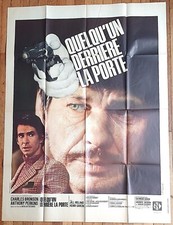 BRONSON QUELQU’UN DERRIÈRE