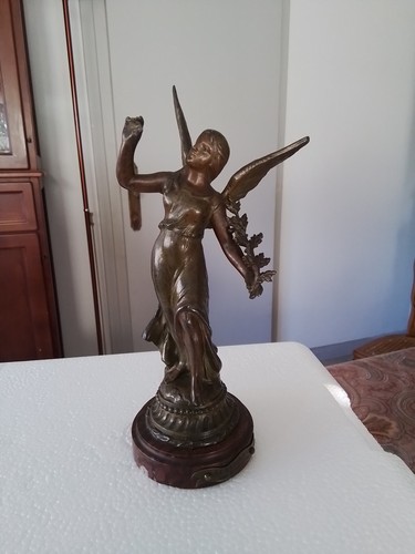 Renommée sculpture en - la,