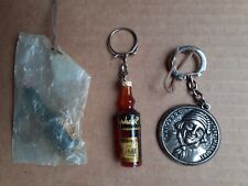 3 porte-clés alcool  années