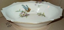 plat creux en porcelaine de limoges W.GUERIN  décor d oiseaux