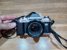 Reflex  CANON AL-1 35mm SLR Camera 50mm f1.8 FD Lens Fonctionnel 