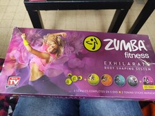 Coffret Zumba Fitness Exhilarate : 5 DVD + Maracas + Guide, Pack Kit 