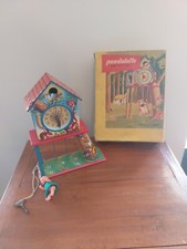 Ancienne pendulette swing-time