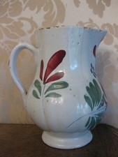 Ancienne carafe en faience