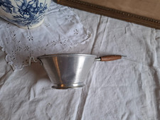 Petite passoire avec poignée