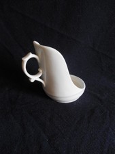 SUPPORT POUR TASSE TREMBLEUSE