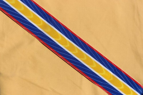 Coupe ruban médaille - de,
