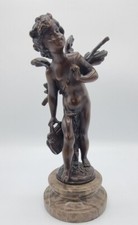 Sculpture chérubin ou enfant au cartable en bronze patinée par Auguste Moreau 