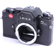 Appareil photo reflex argentique 35 mm électronique noir Leitz Leica R3 boîti...