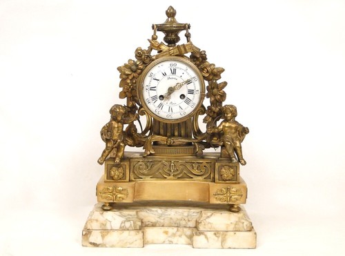 Pendule bronze doré - en, et
