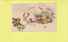 CPA LE PERE NOËL DANS SON TRAINEAU AVEC UN ANGE TIRES PAR UN RENNE