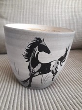 Cache pot vintage au décor de