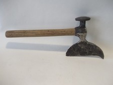 Taquoir ancien en fer forgé