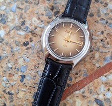 Montre vintage Ricoh Riquartz