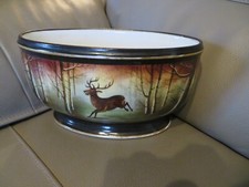 ancienne jardinières ovale en porcelaine à décor de cerf dans la forêt