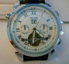 Mtr AUTOMATIQUE A TOURBILLON MIXTE JARAGAR CALENDAIRE ,VUE AR ,TBEG & FONCTIONS