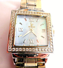 MONTRE VINTAGE 3D-GOLD BOMBE A DATE ,LUNETTE EN FINS SWAROVSKI,TBE & FONCTIONS