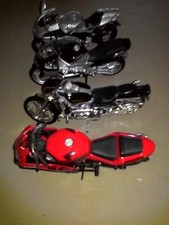 lot de quatres moto 1)18 jouet