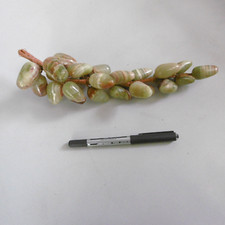 longue grappe de raisin en pierres onyx polies