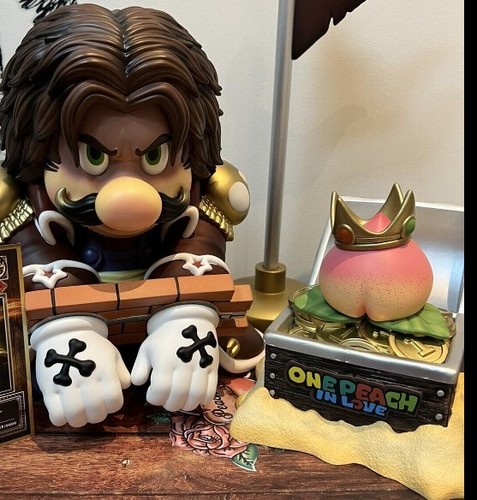 One peach figurine mario - one,