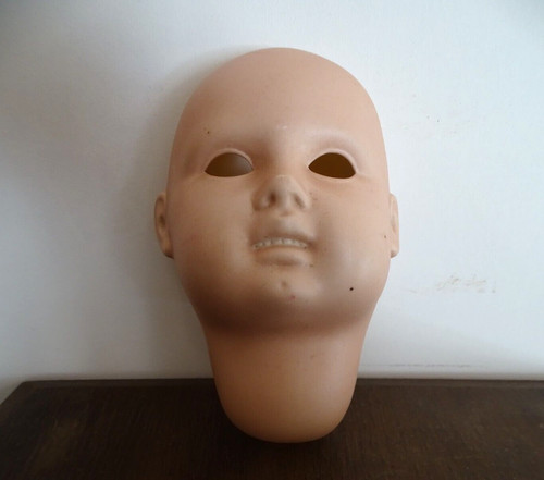 Tête poupée porcelaine