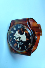 Montre vintage Agatha Paris - boîtier acrylique cadran rond de 3 cm de diamètre