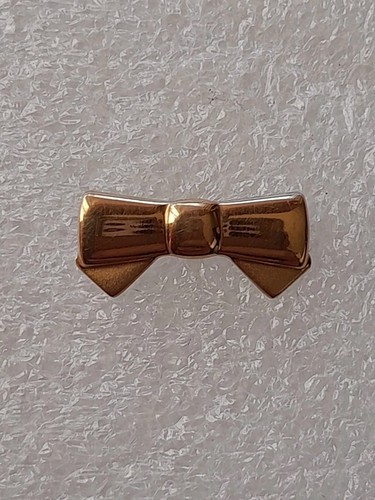 Pin nina ricci noeud - pin's,