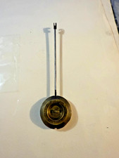ancien balancier pour horloge