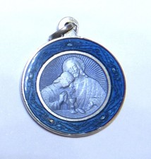 MEDAILLE DE COMMUNION EN ARGENT ET DOUBLE EMAILLAGE BLEU POINCON ORFEVRE