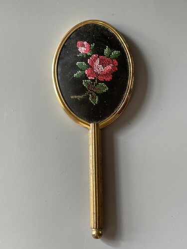 Petit miroir main - main, en