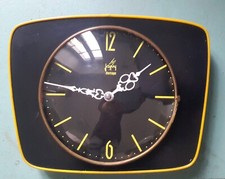 Horloge Formica Japy jaune et
