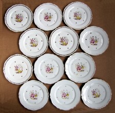 12 assiettes en Porcelaine de