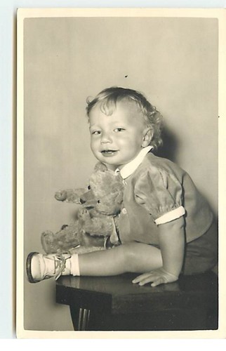 Toy baby holding - -,