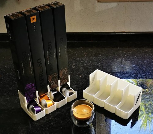 Distributeur capsules - de,