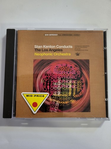 Stan kenton conducts the - conducts,