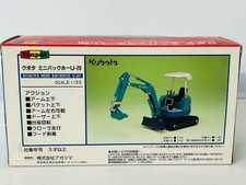 Mini pelle rétrocaveuse