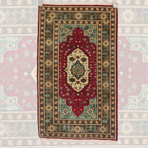Tapis oriental vintage fait