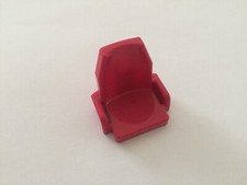Siège rose avec accoudoirs