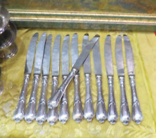 12 anciens grands couteaux metal argenté modele rococo poincon lame inox
