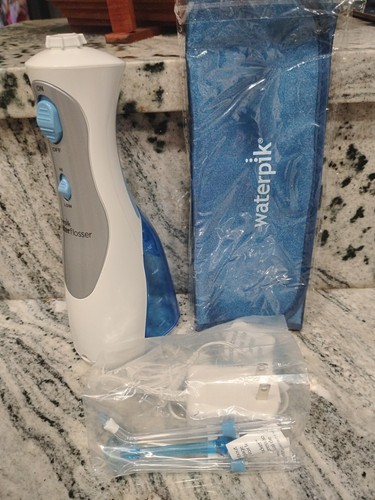 New waterpik cordless plus - new,