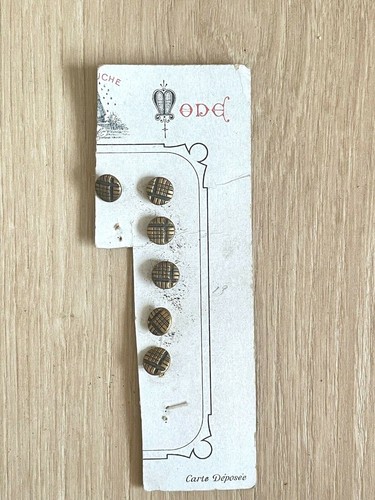 Ancienne plaquette boutons - de,