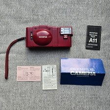 Olympus XA 2 + Flash A11 Rouge rare avec notices + Piles Neuve Testé